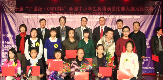 I am the non smiling person in the back row - 3rd from left