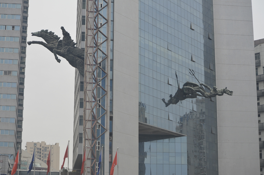 Not sure why they have statues coming out of buildings but in Shenzhen they do.