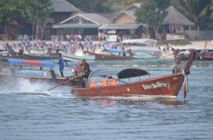 longtail boat from Tigerline Ferry to immigration dock