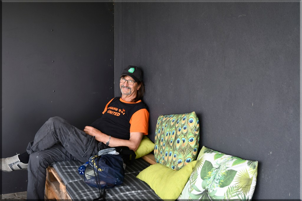 me on couch at tthrift shop after shopping for presents for our loved ones