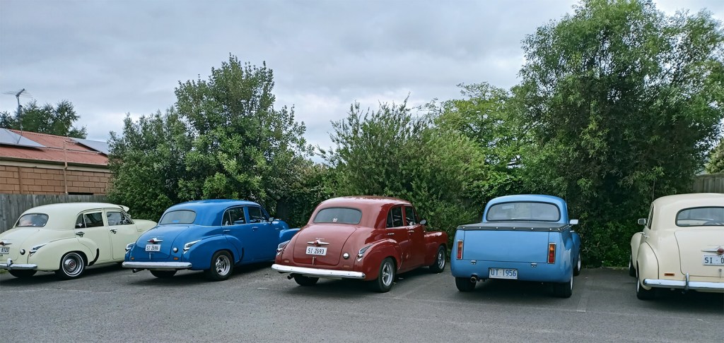 Holden enthusiasts from Tasmania parked in front of a bakery in Yarragon