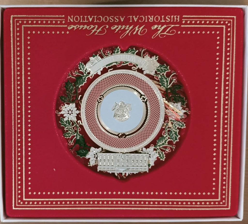 The official, collectible White House Christmas Tree ornaments—often known as "hangings"—are produced annually by the bipartisan White House Historical Association. These 24-karat gold-finished brass ornaments celebrate past U.S. presidents and significant milestones at the executive mansion.
