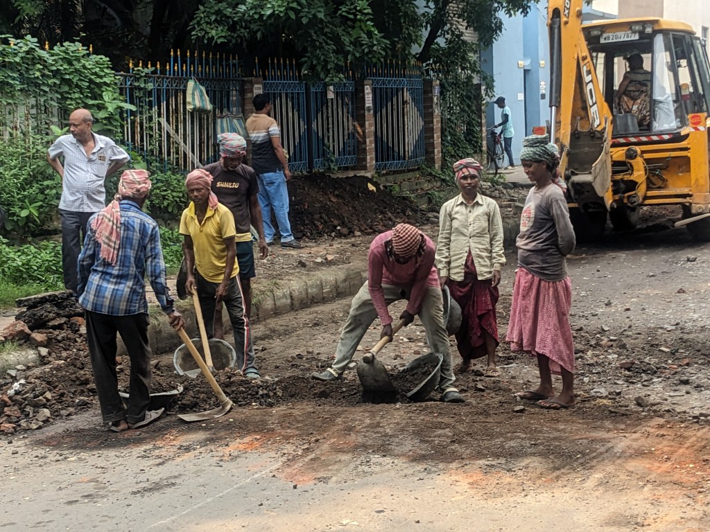 Filling a hole at the end of the street